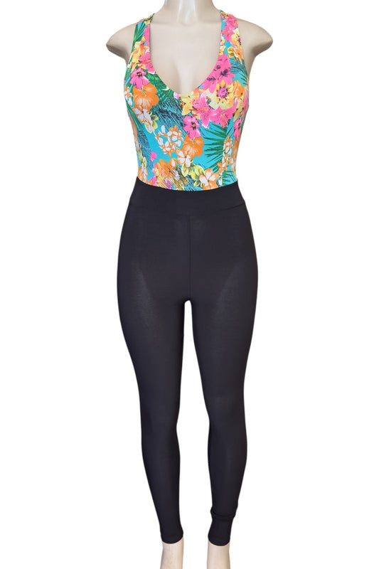 Mannequin wearing a colorful floral top jumpsuit on a white background