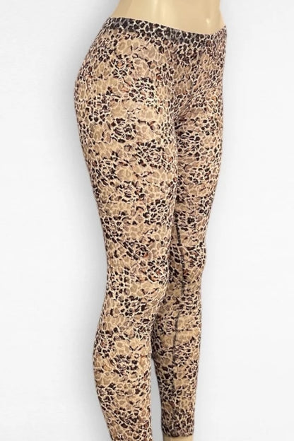 Leopard print leggings on a mannequin against a white background
