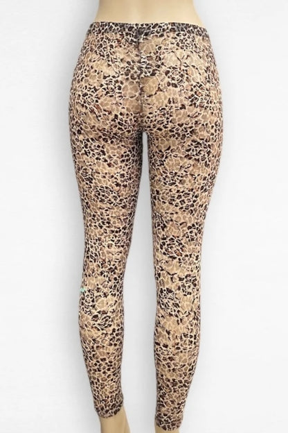 Leopard print leggings on a mannequin against a white background