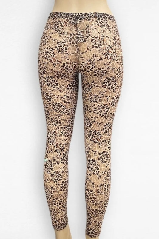 Leopard print leggings on a mannequin against a white background