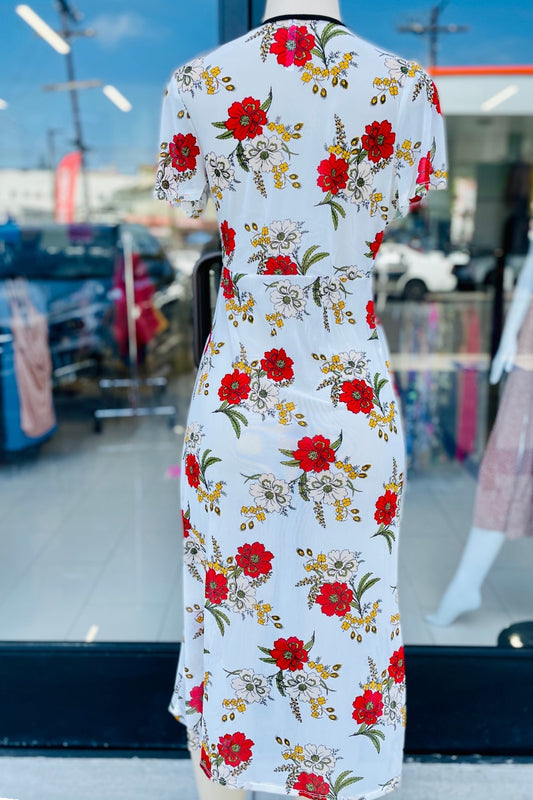 Floral kimono on a mannequin in a store setting