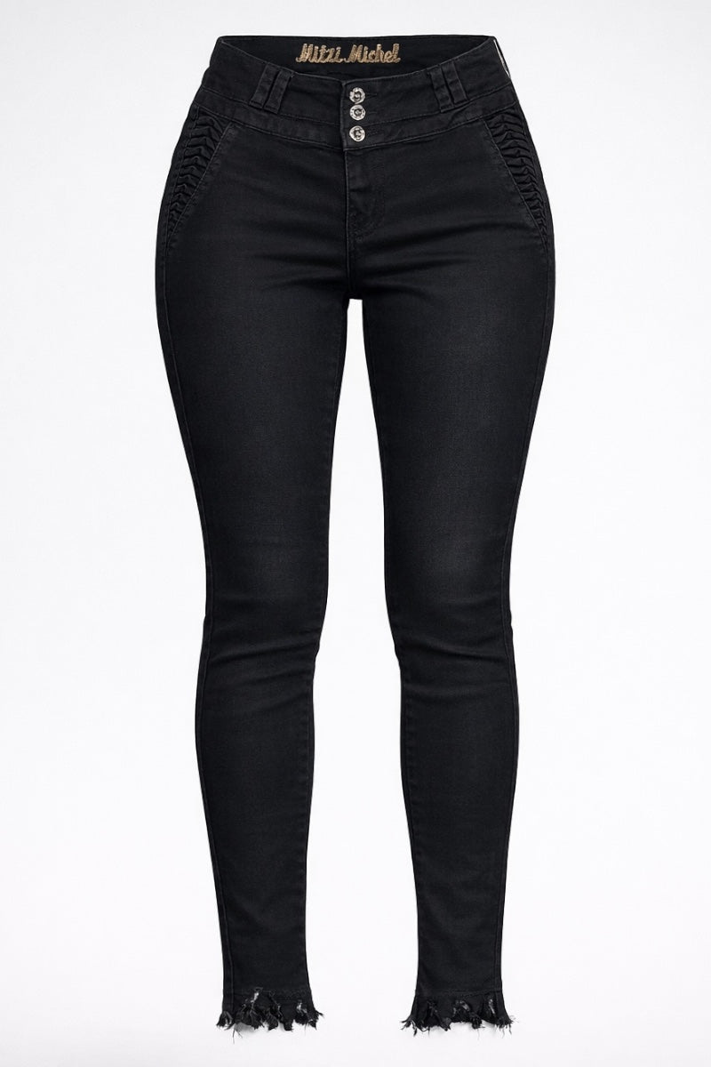 Black jeans with frayed hems on a white background