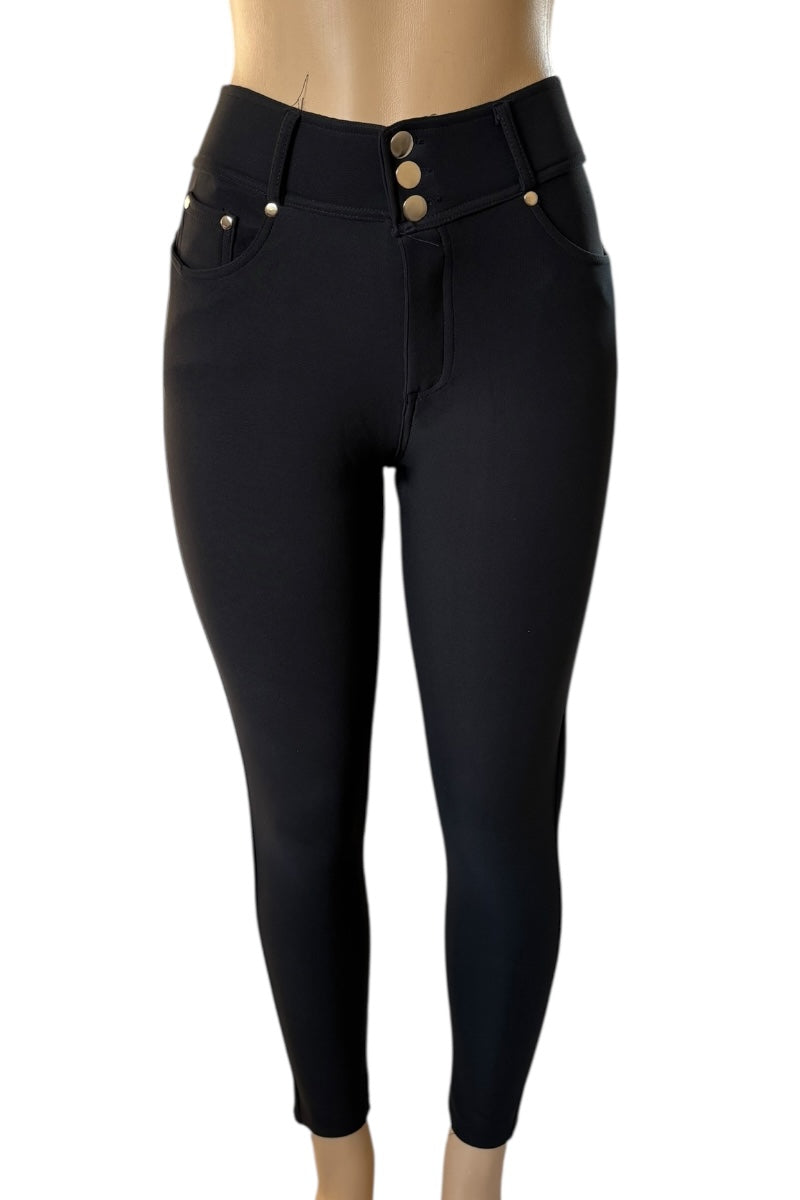 Black pants with button details on a white background