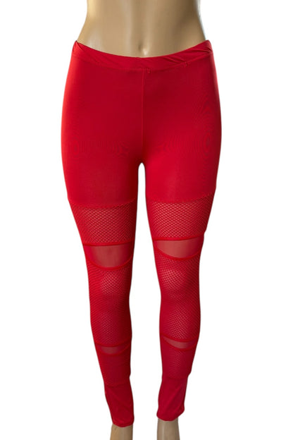 Red leggings with mesh panels on a white background