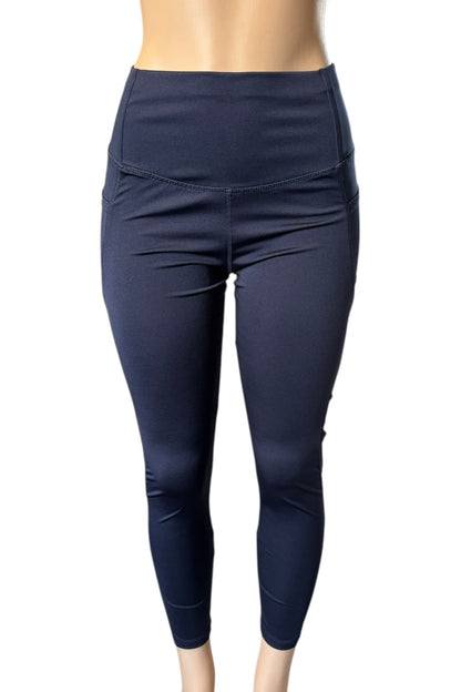 Navy blue leggings on a white background