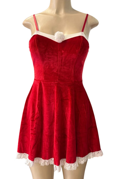 Red dress with lace trim on a mannequin against a white background
