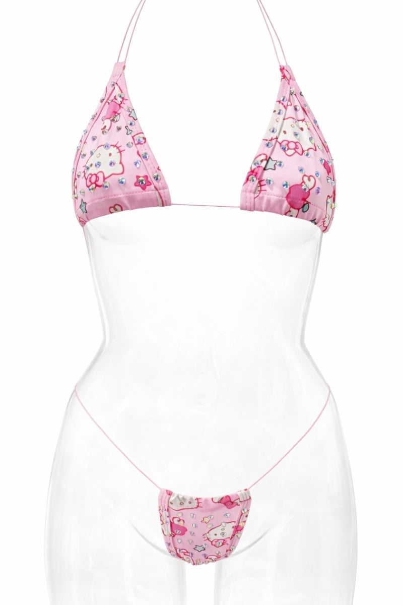 Pink studded top and bottom on a white background