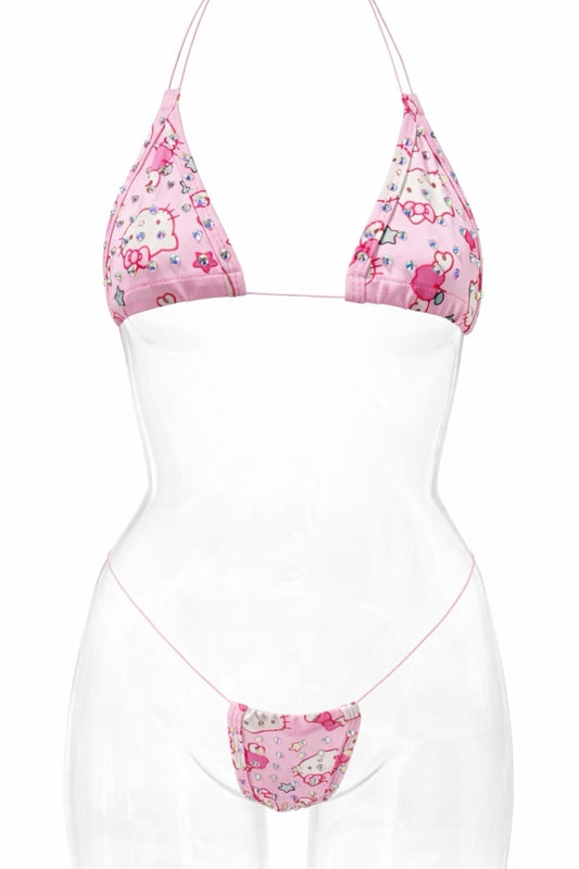 Pink studded top and bottom on a white background