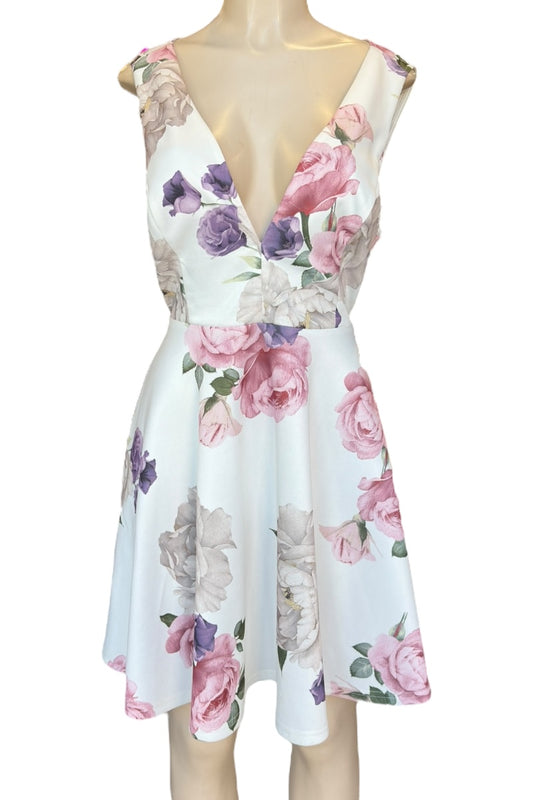 Floral dress on a mannequin with a white background