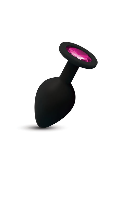 Black silicone plug with pink gem on a white background