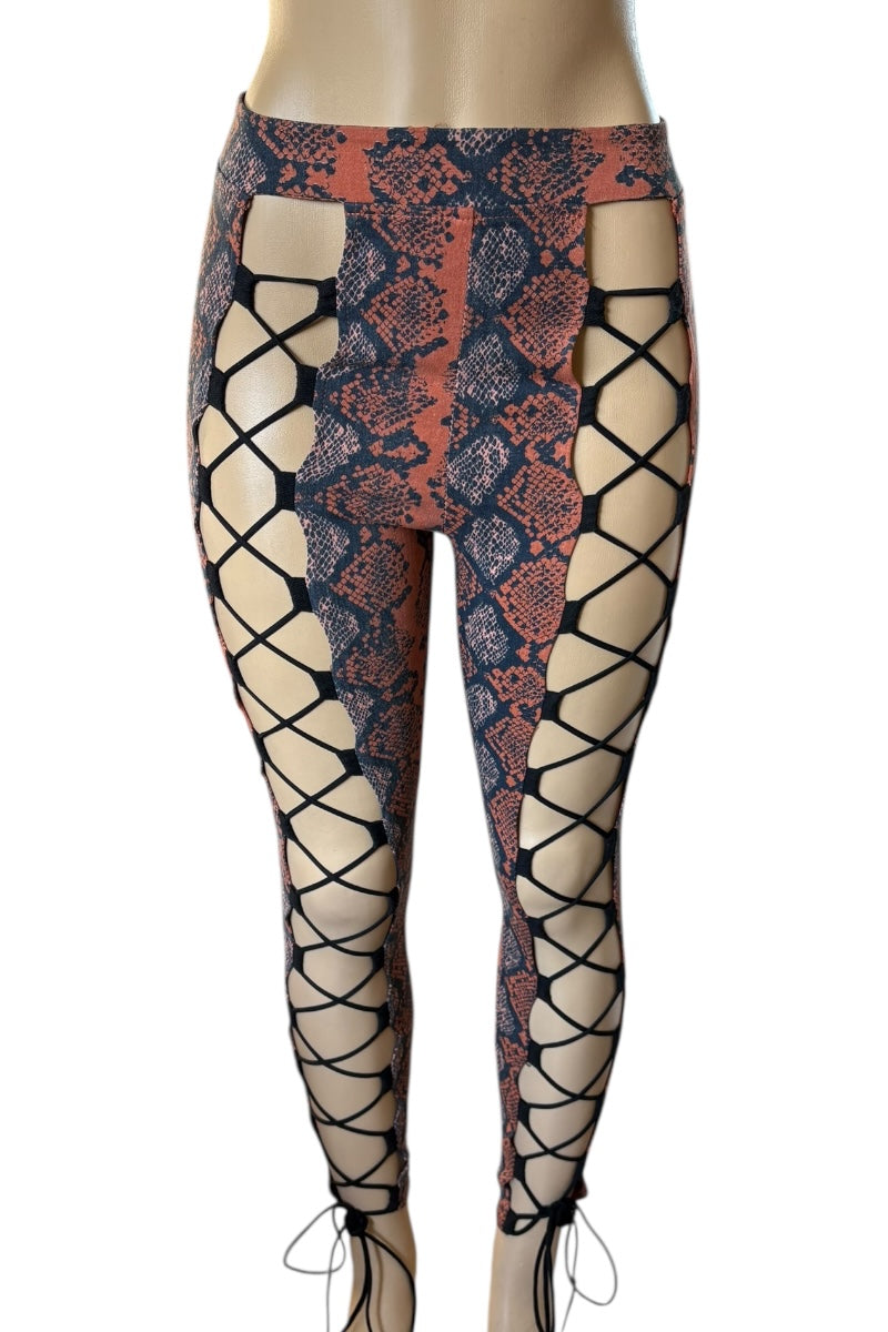 pants with snake print and lace-up design on a white background