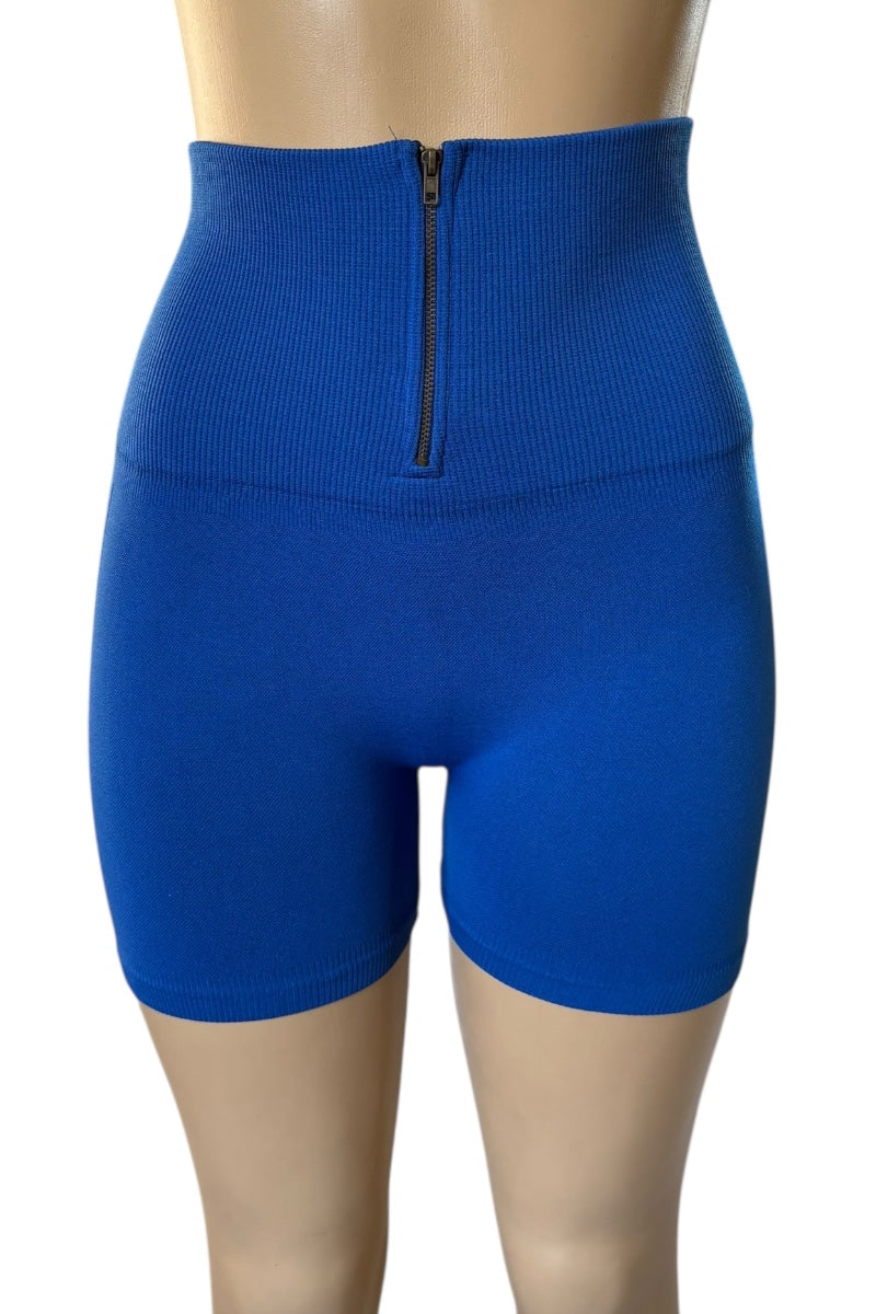 Blue high-waisted shorts with a zipper on a mannequin against a white background