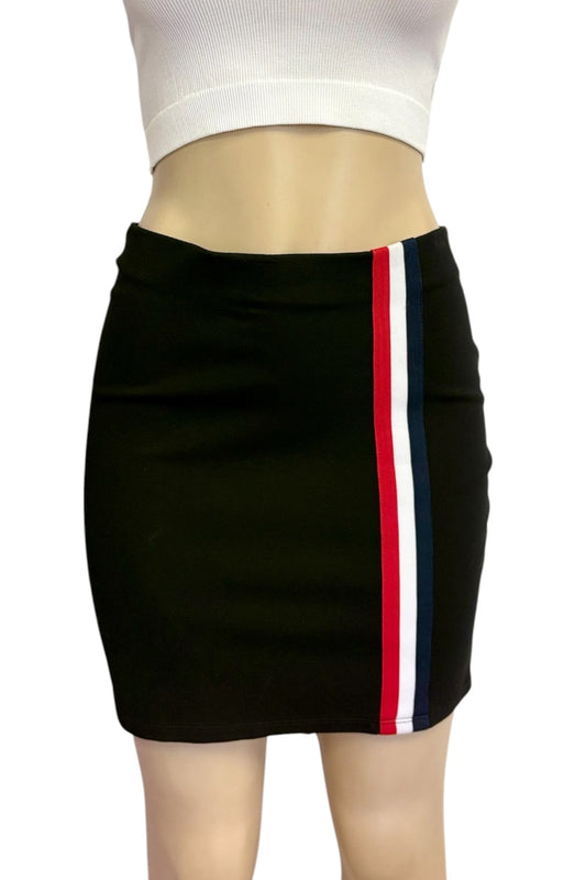 A black bodycon mini skirt with a vertical red, white, and navy blue stripe down the side, displayed on a mannequin torso with a white ribbed crop top against a white background.