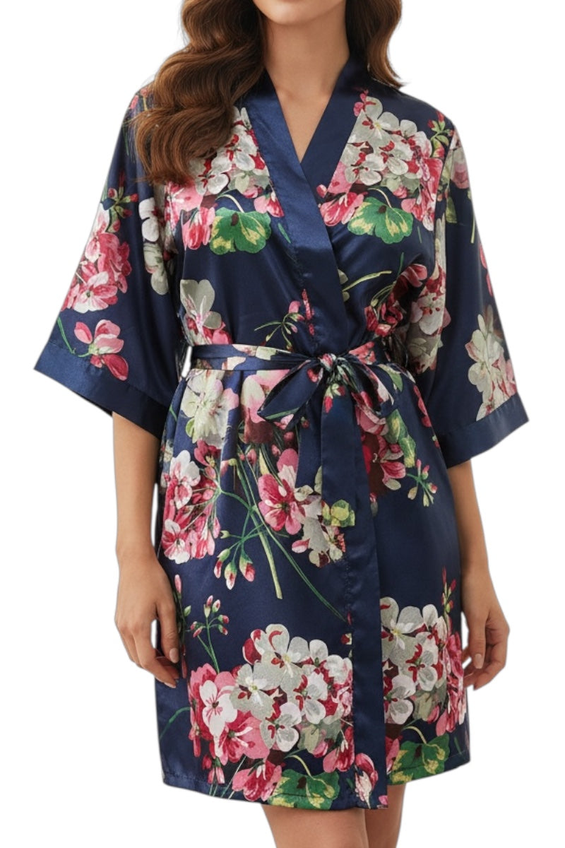 Floral robe with a navy background worn by a model
