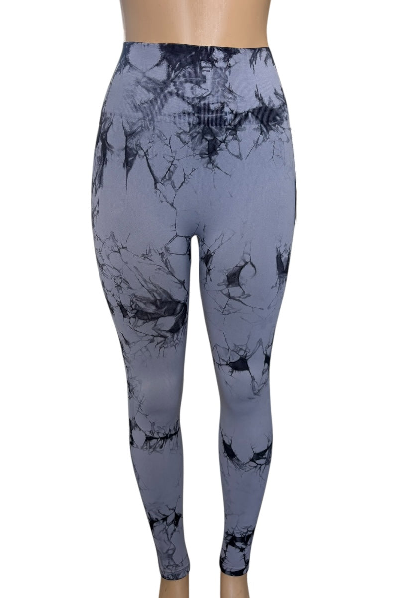Gray leggings with black abstract pattern on a white background