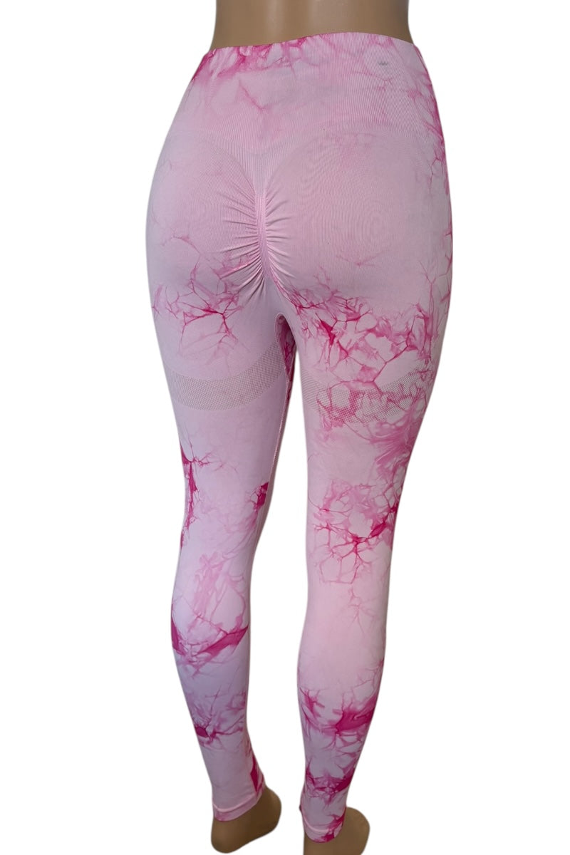 Pink tie-dye leggings on a white background