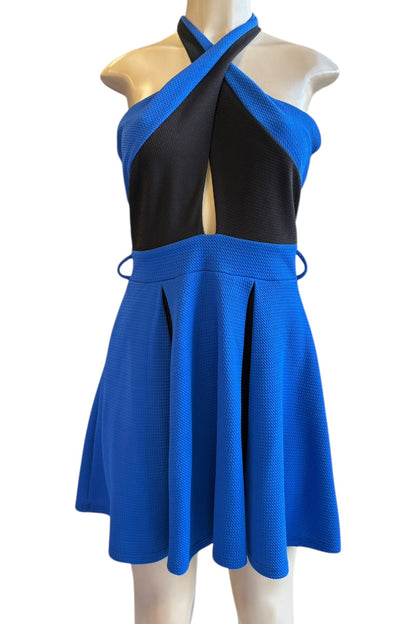 Blue and black dress on a mannequin against a white background