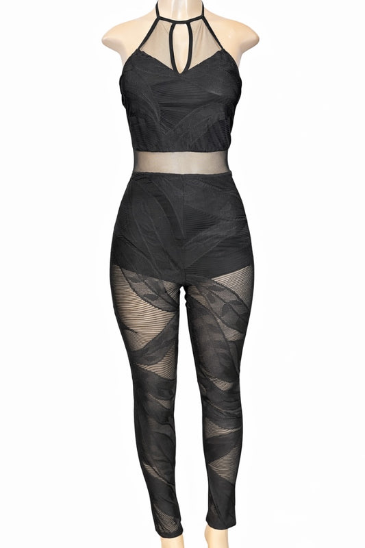 Black mesh jumpsuit on a mannequin against a white background