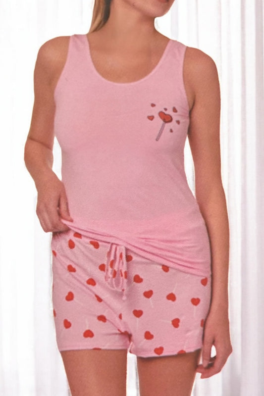 Pink tank top and shorts set with heart design on a white background