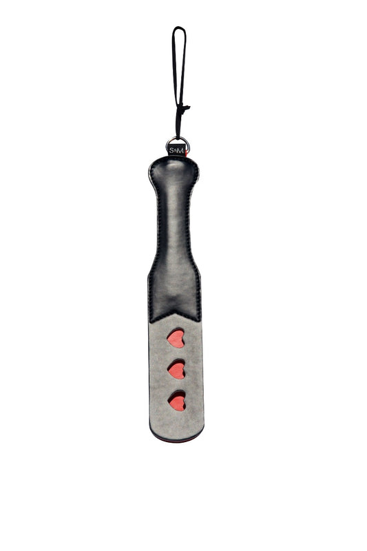 Black leather paddle with red accents on a white background