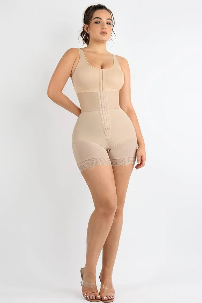 Woman wearing a beige shapewear on a white background