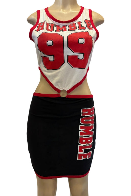 Red and white dress with 'HUMBLE' and number '99', on a mannequin.