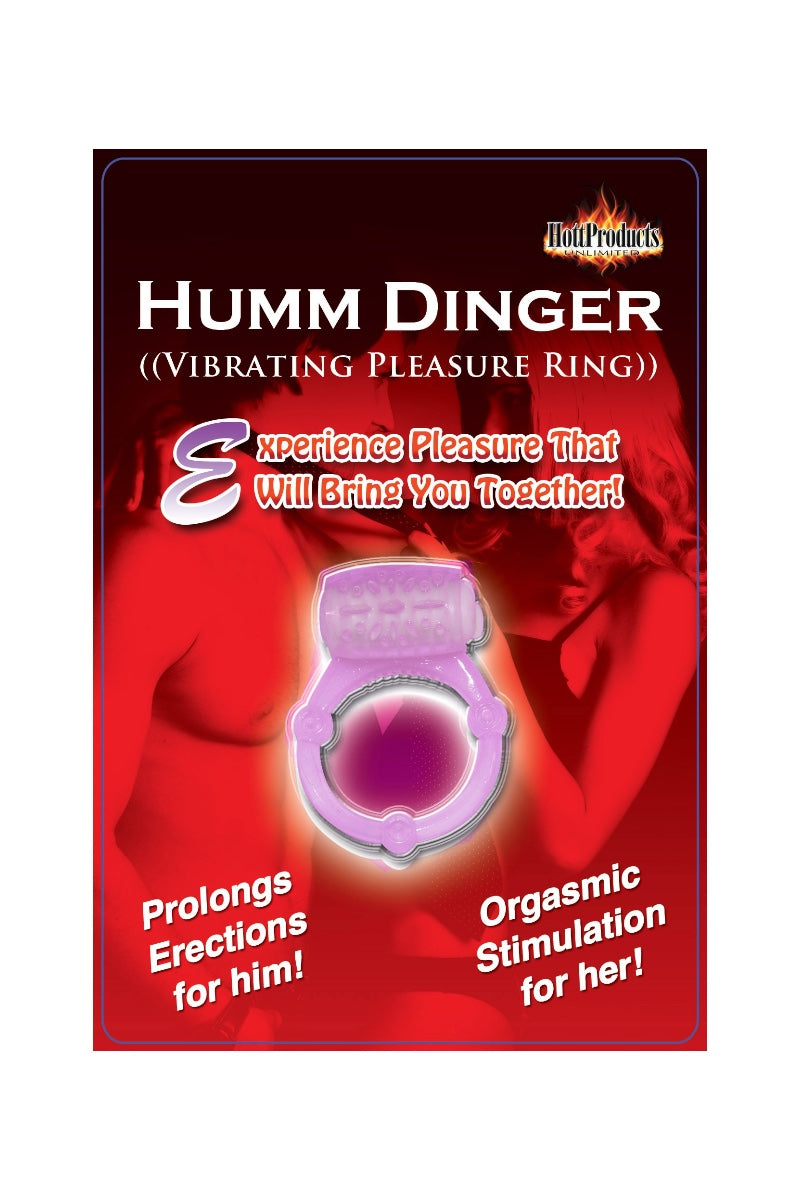 Product packaging for 'Humm Dinger' vibrating pleasure ring with red background and purple ring.