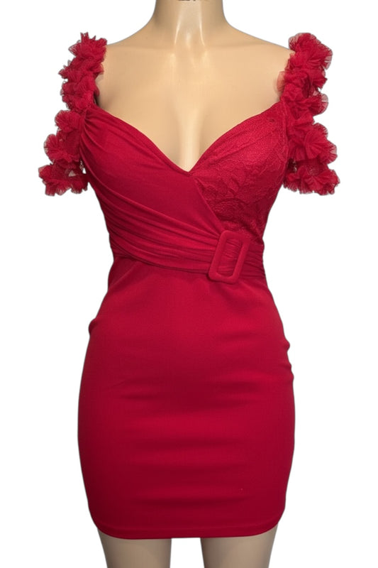 Red dress with floral shoulder details on a mannequin against a white background