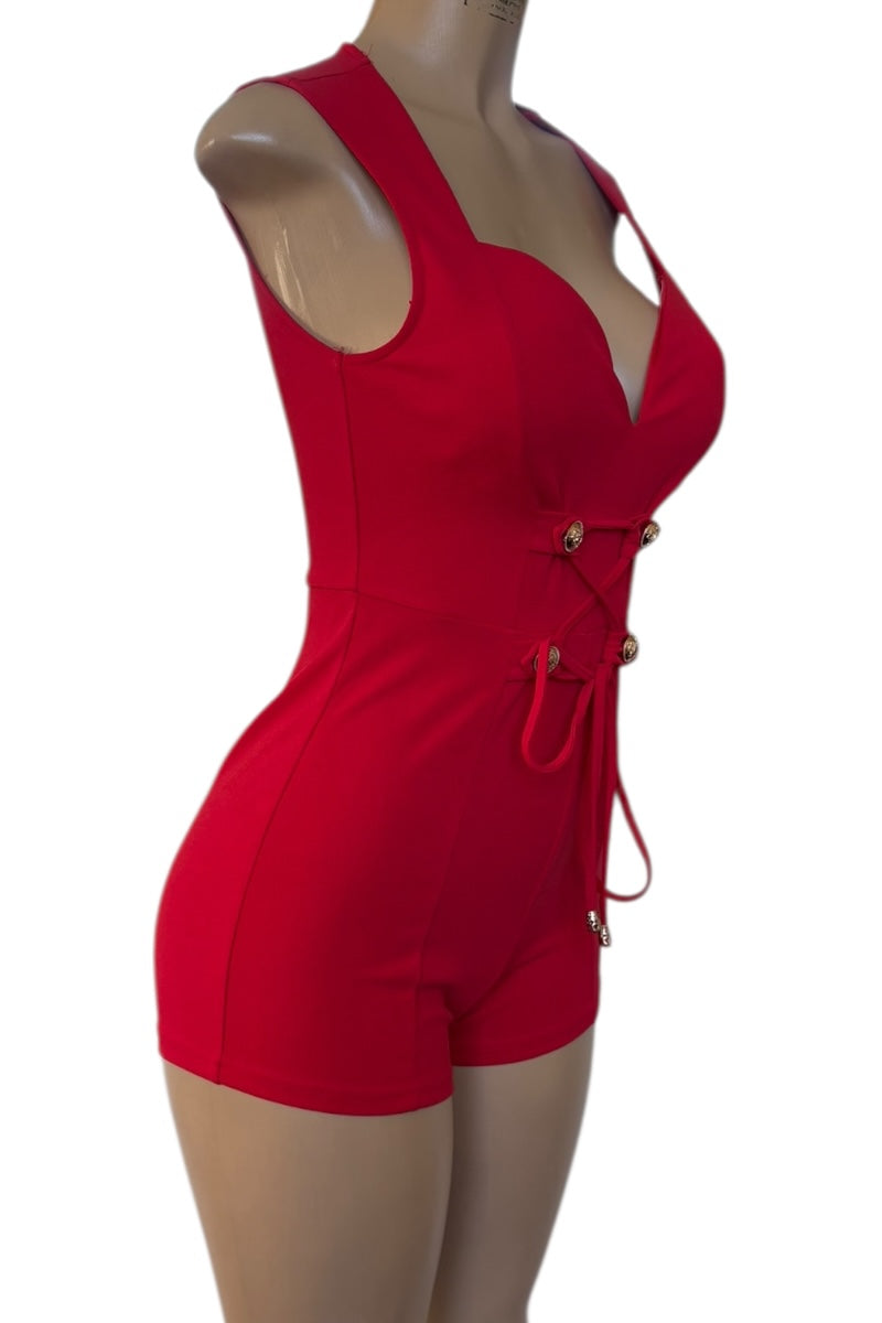 Red romper on a mannequin against a white background
