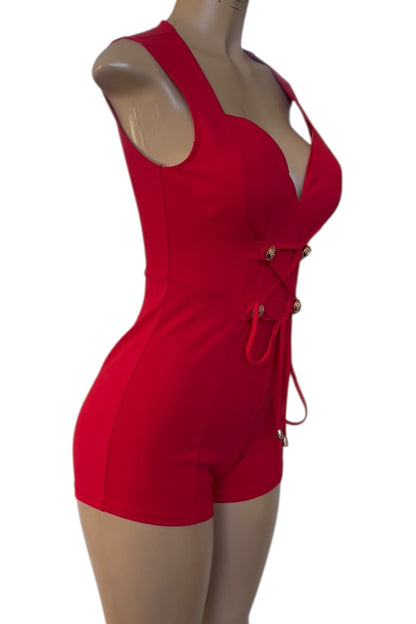 Red romper on a mannequin against a white background