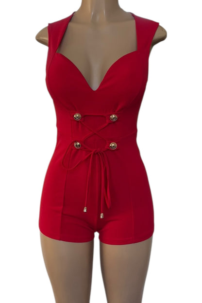 Red romper on a mannequin against a white background