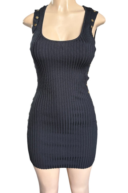 Black ribbed dress on a mannequin against a white background
