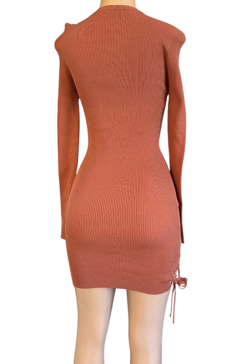 Terracotta ribbed knit dress on a white background