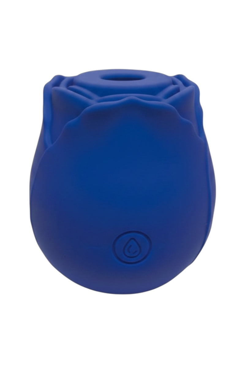 Blue silicone bulbous object with a central hole on a white background