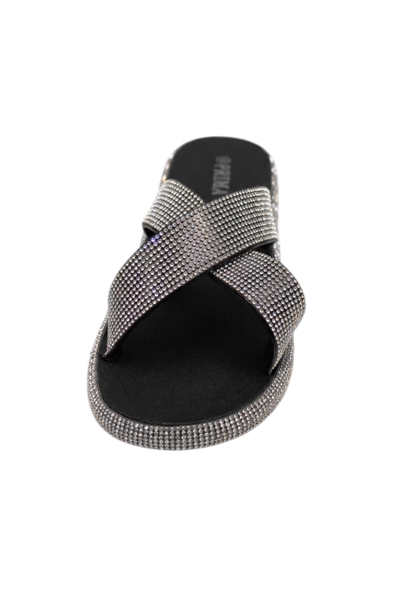 Black sandal with criss-cross straps and rhinestone embellishments on a white background