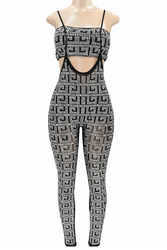 Black and silver patterned jumpsuit on a mannequin against a white background