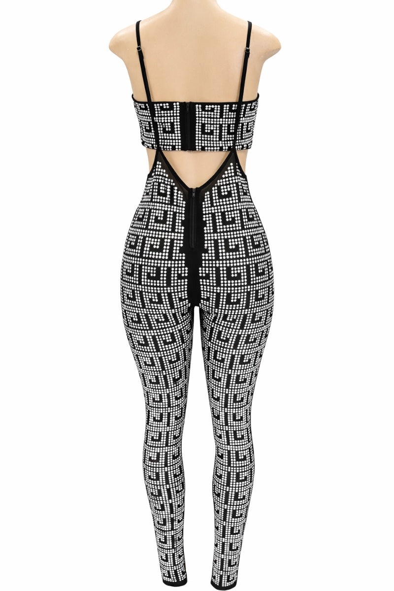 Black and silver patterned jumpsuit on a mannequin against a white background
