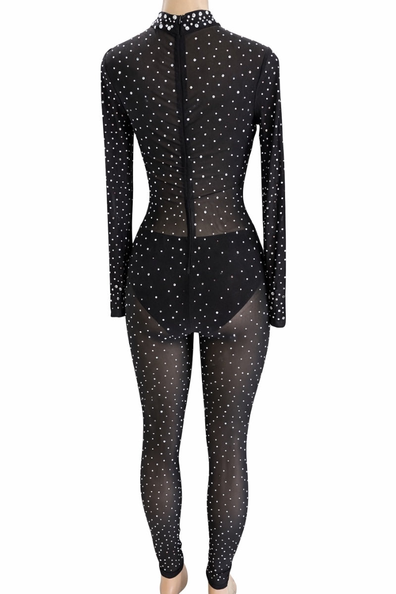 Black rhinestone jumpsuit with sheer overlay on a white background