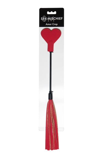 Red amor crop with heart-shaped end on packaging labeled 'Sex Mischief'.