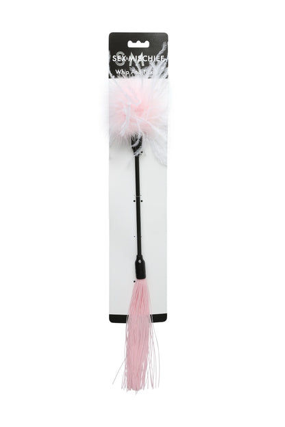 Pink feathered object with tassel on a white background, branded 'Sex Whistle'.