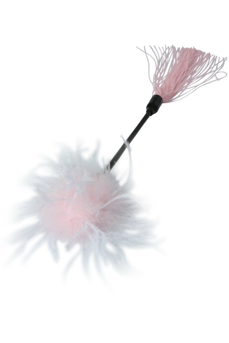 whip with pink and white feathers on a white background