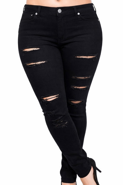Black distressed jeans on a white background