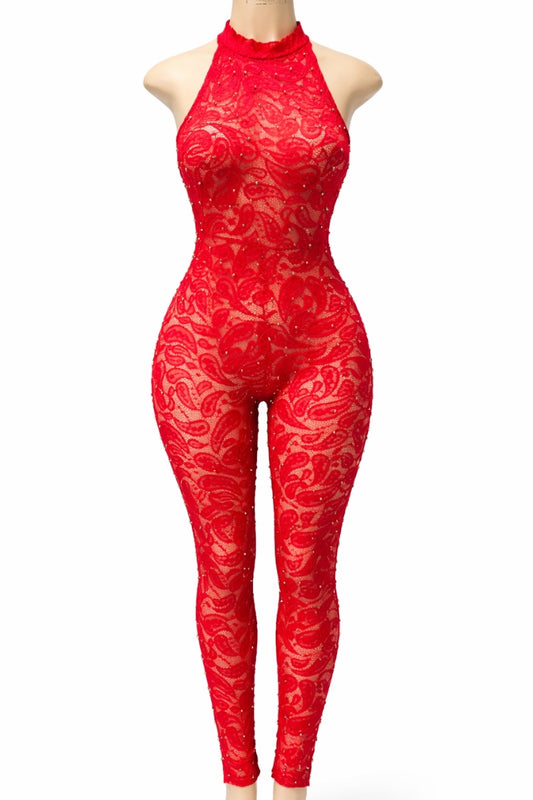 Red patterned jumpsuit on a mannequin against a white background