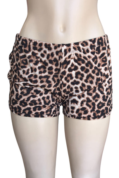Leopard print shorts on a mannequin against a white background