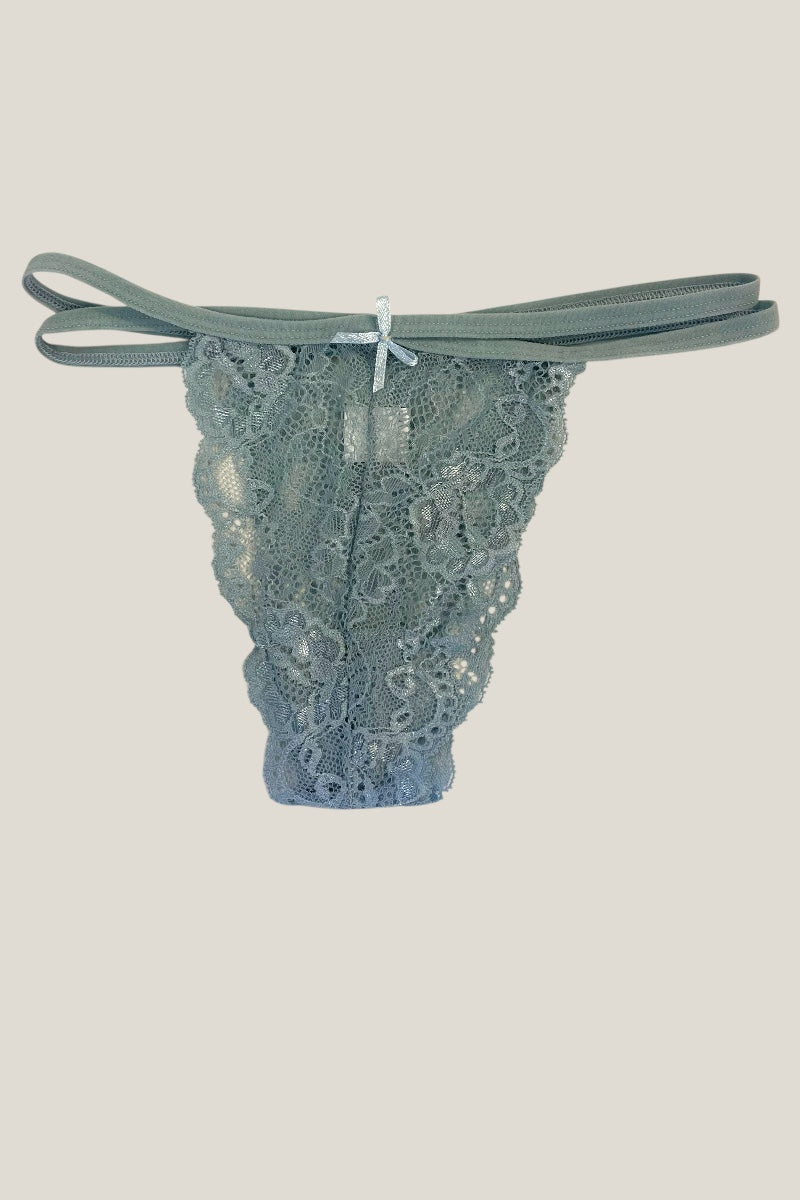 blue lace thong on a light gray background