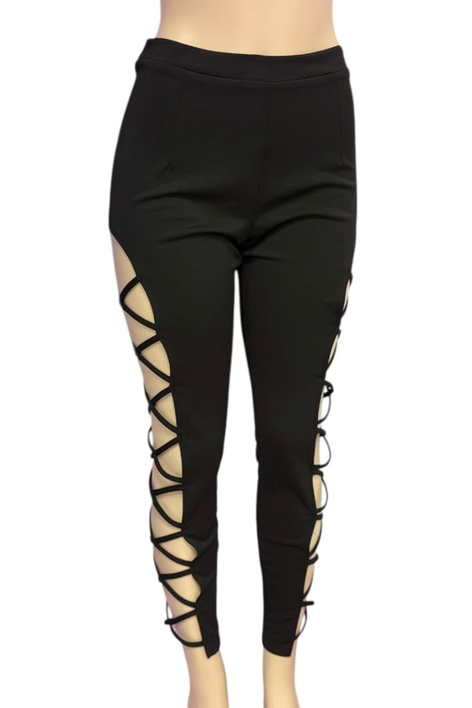 Black leggings with lace-up sides on a white background