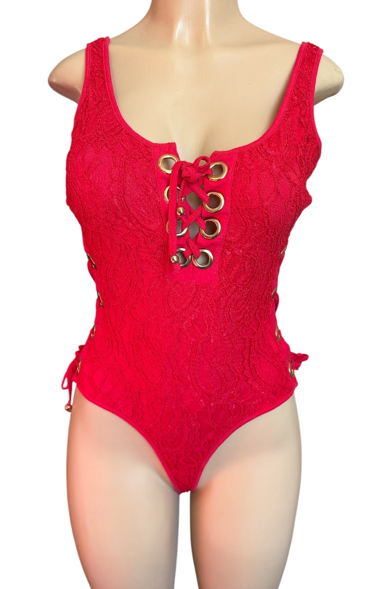 Red lace-up bodysuit on a mannequin against a white background