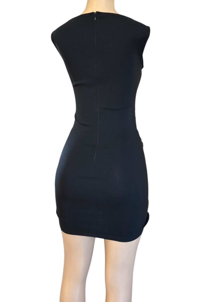 Black dress on a mannequin against a white background