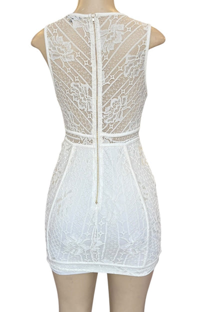 White lace dress on a mannequin against a white background
