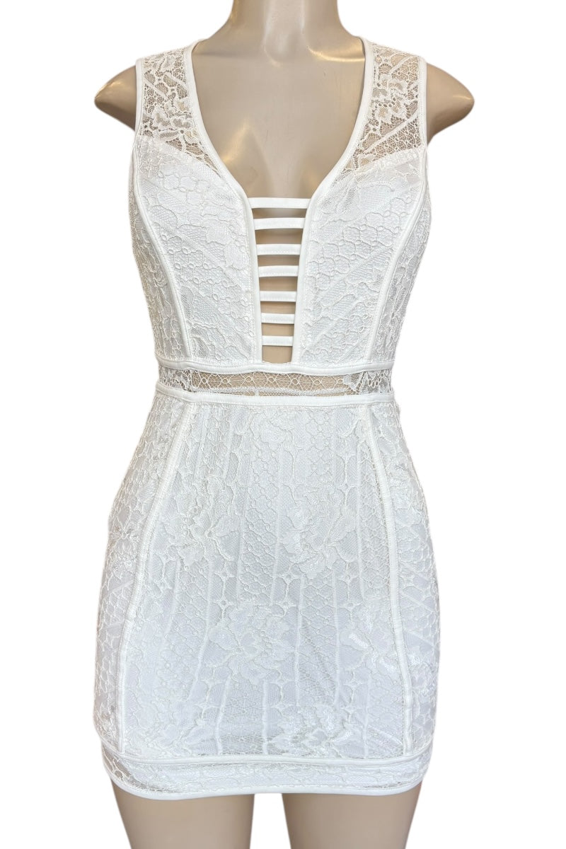 White lace dress on a mannequin against a white background